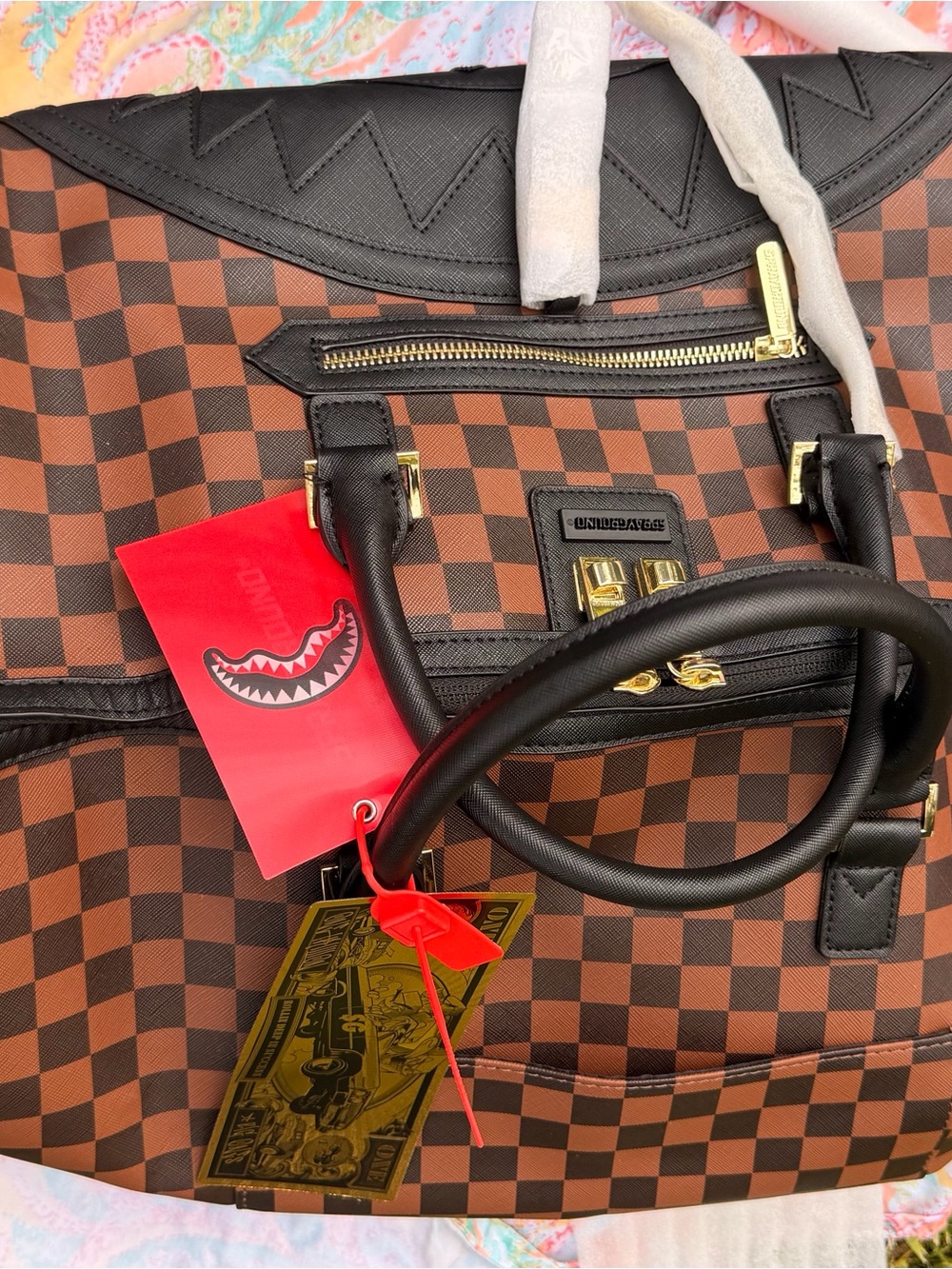 Sprayground Brown Checkerboard Duffel with Black Trim and Gold Hardware